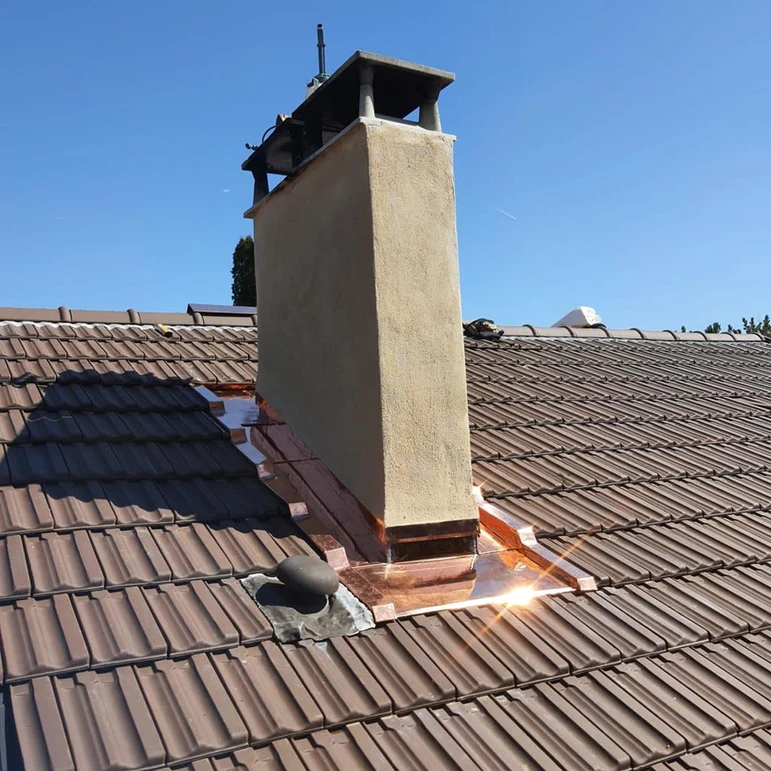 specialiste renovation toiture cheminee